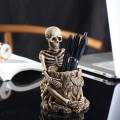 OUMERY Skull Skeleton Pen Holder Stand Pen Cup Makeup Brush Holder Desk Accessories Organizer for Home Office Desktop Decor. 