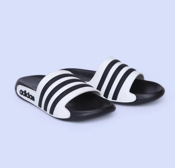 Men%E2%80%99s%20Adidas-PUMA%20Style%20Black%20&%20White%20Slide%20Slippers%20%E2%80%93%20Lightweight,%20CoMen%E2%80%99s%20Black%20&%20White%20Striped%20Casual%20Slides%20%E2%80%93%20-%20Image%205