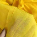 Trendy Collection with Elegant Style Yellow Colour Flat Muslin Than Saree for Women - Perfect Ethnic Wear.