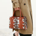 Women's large-capacity contrasting snake print premium sense commuter bag Business commuter PU shoulder crossbody tote bag.