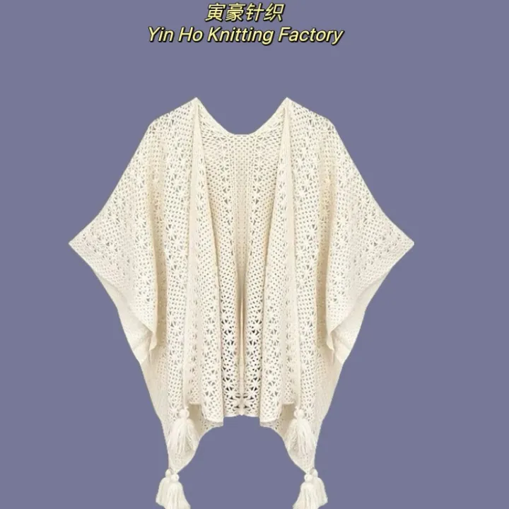 The%20new%20solid%20color%20cut-out%20decoration%20knitted%20ethnic%20shawl%20with%20furball%20cape%20and%20tassel%20in%20summer%20is%20a%20designer%20model%20-%20Image%202