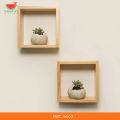 Modern wood wall decor with 2 square boxes design. Material: Wood.