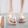 2022 Imitation Grass Woven Hemp soled Sandals Han Chao Wears Rubber Sole Herringbone Bottom Beach Flat Heel Clip Feet Women's Slippers.