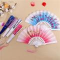 Floral Folding Hand Fan Vintage Handheld Folding Fan with Different Flower Patterns Fabric Folding Fan for Wedding Dancing Party.