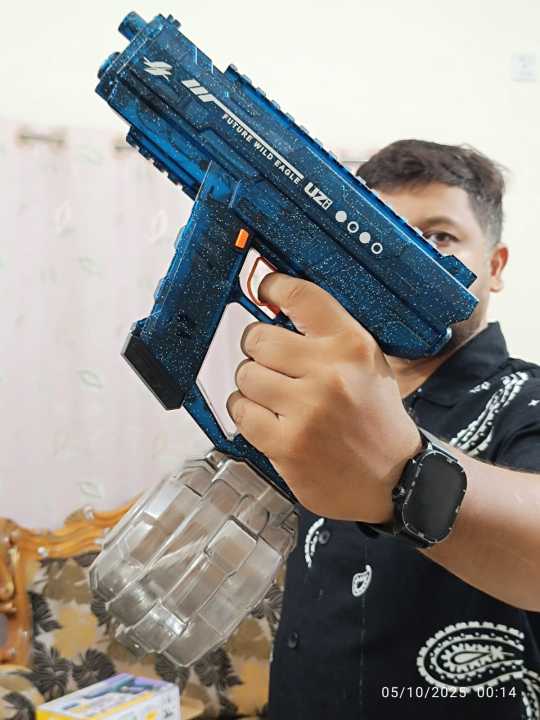 UZI%20Ice%20Horn%20Electric%20Water%20Gun%20%E2%80%93%20800ml%20Capacity%20%7C%2010m%20Range%20%7C%20Colorful%20Lights%20%7C%20Rechargeable%20Battery%20-%20Image%204