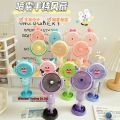 Stylish Cute Rechargeable Hand Fan With Mobile Stand & Spray For Indoor & Outdoor Use - Multicolor. 
