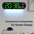 Remote Control Oval Digital Wall Clock Large LED Screen Temperature Humidity Display. 
