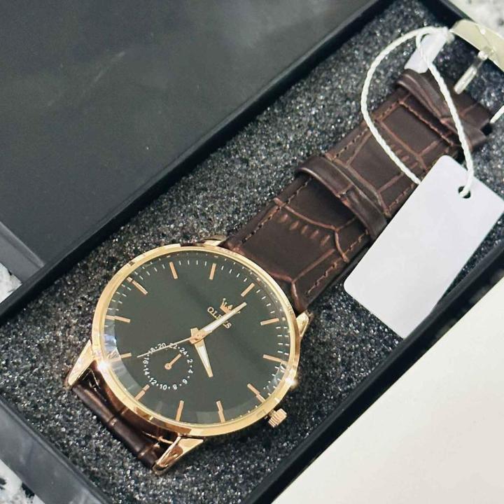 New olevs leather analog sports watch for men-a round shape and men's standard size with pu leather strap