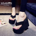 High heeled slippers for women in summer, thick soled herringbone beach shoes, sloping heels, clip on sandals, and sponge shoes. 