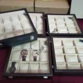 Safely store your watche Box in a 12-slot wooden clock box with leather finish, keeping your timepieces fashionable and maintained..