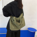Japanese and Korean large-capacity washed canvas bag women's simple casual literary tote bag shoulder bag student class crossbody bag.