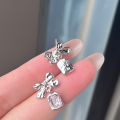 Bow zircon stud earrings women's light luxury, exquisite niche design, simple and versatile, fashionable, high-end temperament ear jewelry.