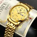 premium quality full golden color TRSOYE brand mechanical waterproof stainless steel men's watch.