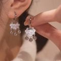 Sense of luxury, temperament, safety lock earrings, niche personality, bell earrings, fashion ear accessories wholesale.