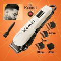 Kemei KM-809A is a professional-grade hair clipper featuring a digital display and dual AC/DC power for smooth and powerful trimming.. 