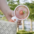 Convenient and ultra-quiet USB mini handheld wind power fan with portable phone holder student office small cooling fans. 