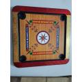 Plastic Carrom Board (Both side play : One side Carrom board & Other side Ludu ).Board game - Multi color - (12 *12) Inch. 