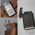Transformers Grey/Bronze Cigarette Lighter. 