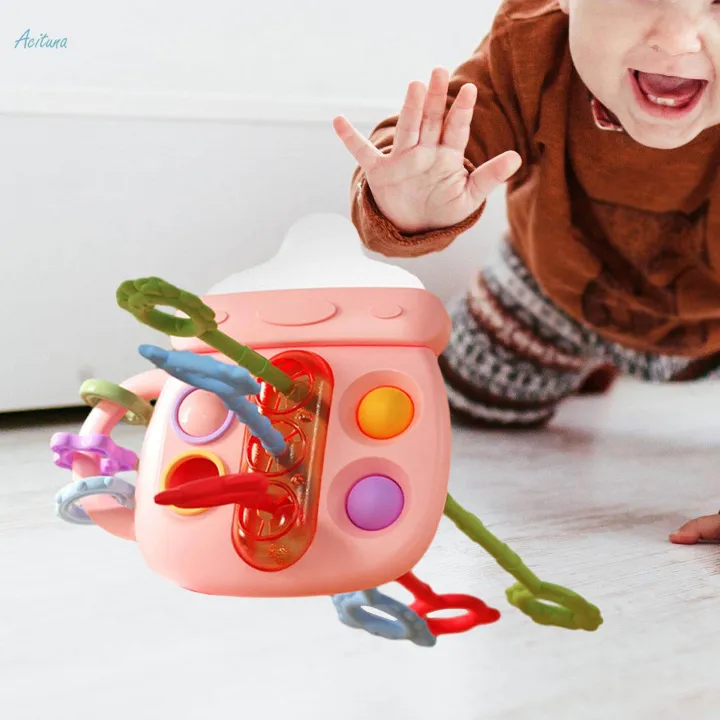 Baby%20Bottle%20Shaped%20Teething%20Toy%20Rattle%20Toy%20for%20Toddlers%203-6%20Months%20Newborns%20-%20Image%203