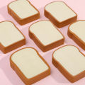 A Bag of Cute 3D Replica Toast Bread Shaped Children's Eraser Set.