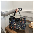 Large capacity one-shoulder handbag  new niche ins canvas bag lazy style tote class commuter bag. 