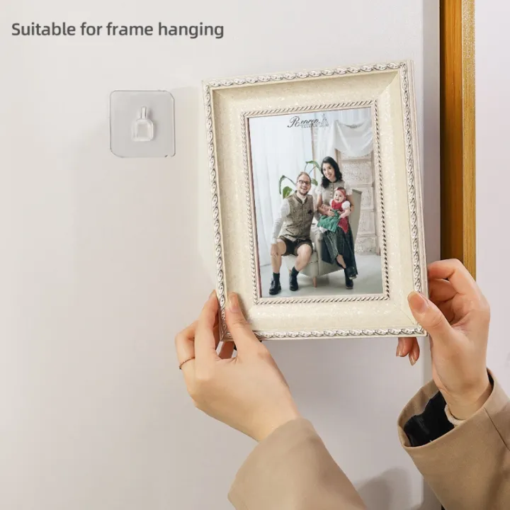 Transparent%20Seamless%20Strong%20Self%20Adhesive%20Sticker%20Hook%20Holder%20Photo%20Frame%20Painting%20Picture%20Poster%20Clock%20No%20Drill%20Wall%20Hanger%20Hooks%20Home%20Storage%20Tool%20-%20Image%202
