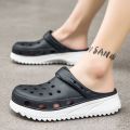 Summer New Coros Shoes Men's Big Toe Slippers Thick Bottom Leisure Pump Sandals Bird's Nest Non-Slip Sandals. 