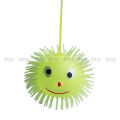Smile Face Puffer Ball with Flashing Light Stress Relief Squeeze Ball Fun Toy for Children and Adults (Random Color) Pack of 1.