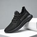 Men's shoes, mesh breathable running shoes, men's trendy casual soft-soled fly-knit shoes, spring and autumn versatile sports men's fashion shoes. 