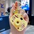 Cartoon Sanrio camera keychain children's toys luminous projection camera car keychain small gifts. 