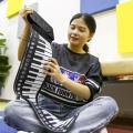 Portable 49-Key Flexible Silicone Roll Up Piano Folding Electronic Keyboard. 