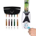 Toothpaste Dispenser Plus Toothbrush Holder a Tooth paste dispenser with tooth brush holder bathroom accessories bathroom fittings shelf rack.
