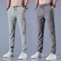Xia Xiu thin ice silk casual pants men's work trend loose straight breathable sports cropped pants men.