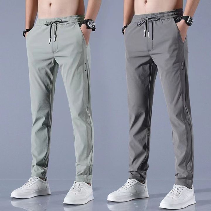 Xia Xiu thin ice silk casual pants men's work trend loose straight breathable sports cropped pants men