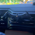 Cross-border bat gravity car mobile phone holder cartoon air outlet navigation support frame universal mobile phone holder. 