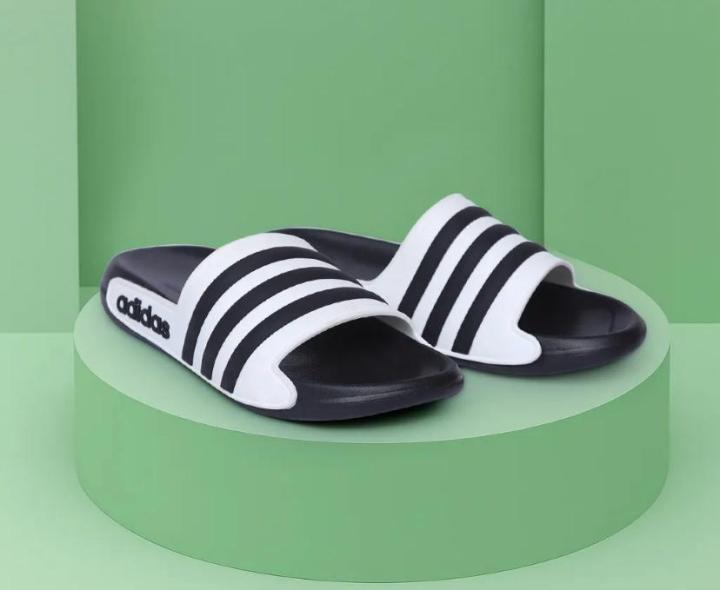 Men%E2%80%99s%20Adidas-PUMA%20Style%20Black%20&%20White%20Slide%20Slippers%20%E2%80%93%20Lightweight,%20CoMen%E2%80%99s%20Black%20&%20White%20Striped%20Casual%20Slides%20%E2%80%93%20-%20Image%204
