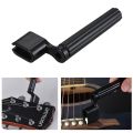Plastic acoustic electric guitar bass string winding device bridge needle puller - black.