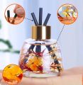 Elegant Car Dashboard Air Freshener with Scented Diffuser Sticks - Long-Lasting Fragrance for Vehicles.