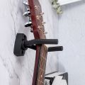 String Swing ACG-10 Guitar Hanger and Guitar Wall Mount Bracket Holder for Acoustic and Electric Guitars Black Walnut. 