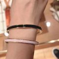H Aijia Xiaohongshu recommends enamel round letters epoxy glue color plain circle titanium steel bracelet wholesale cross-border e-commerce. 