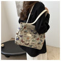 Large capacity one-shoulder handbag  new niche ins canvas bag lazy style tote class commuter bag. 