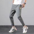 New Mens Trousers Summer Ice Silk Thin Green Color Fashion Elastic Waist Nine Points Length Pants Men Casual Sports Joggers Pant. 