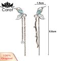 Carat Women Drop Earrings Chic Butterfly Tassel Earrings with Faux Pearls Rhinestones Trendy Asymmetric Design for Women Perfect for Fashionistas Rhinestones Inlaid Earrings. 