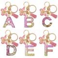 A To Z Pink Snowflakes Filled Letter Keychain Women Wallet Charms 26 Initials Alphabet Butterfly Tassel Pendant With Key Rings Women Girl Handbags Jewelry Gift.