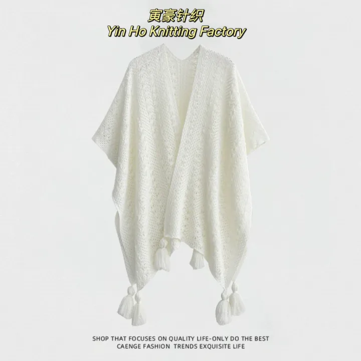 The%20new%20solid%20color%20cut-out%20decoration%20knitted%20ethnic%20shawl%20with%20furball%20cape%20and%20tassel%20in%20summer%20is%20a%20designer%20model%20-%20Image%204