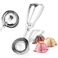 stainless steel ice cream scoop spoon with a trigger release mechanism..