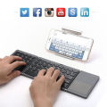 B033 Mini Wireless Keyboard Bluetooth Touchpad Portable Magnetic Triple Folding Keyboard for Windows Android IOS iPad Phone.