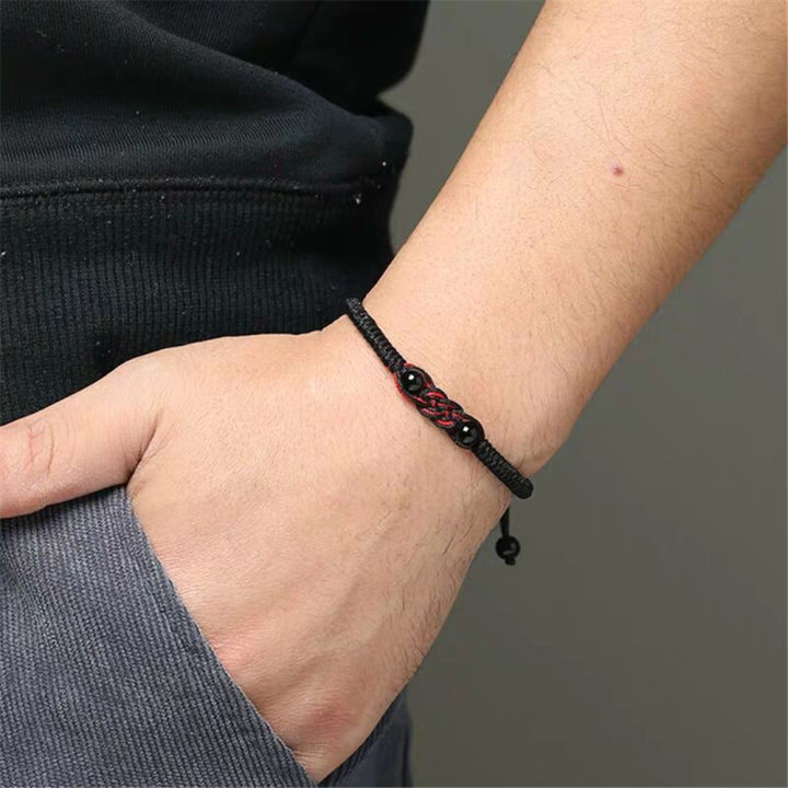 charm detail Ethnic bracelet Stylish Adjustable size Handmade rope material Woven amulet bracelet Ethnic design Woven craftsmanship Adjustable bracelet for wear Yoga and meditation Ethnic fashion