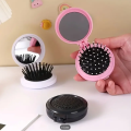 Mini Foldable Hair Brush With Mirror For Women and Girls.