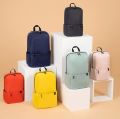 Compact Mi Shoulder Bag - Mini Backpack for Men and Women - Black Sports and Travel Companion.